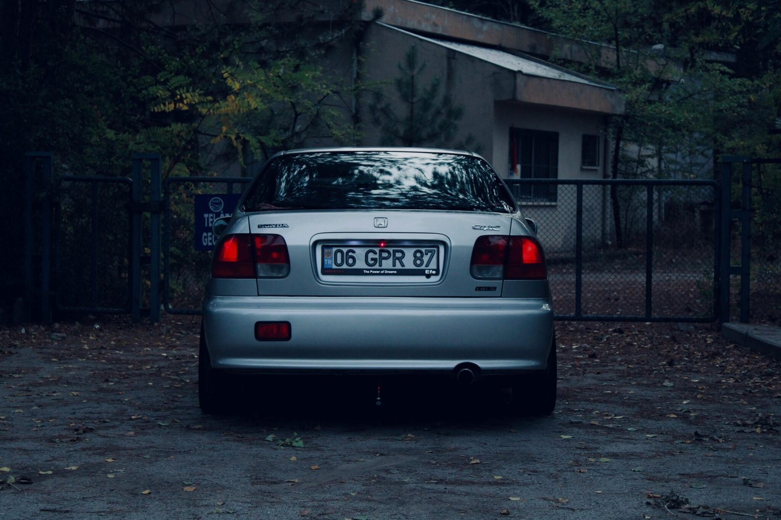 A drone's aerial view over a cityscape highlights license-plate surveillance technology and innovation.