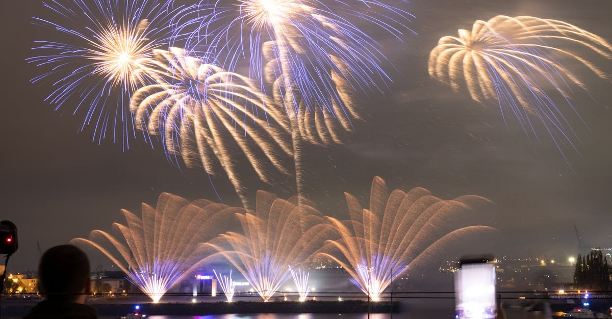 Aerial view of a drone light show over cityscape, highlighting drone technology and swarm innovation.