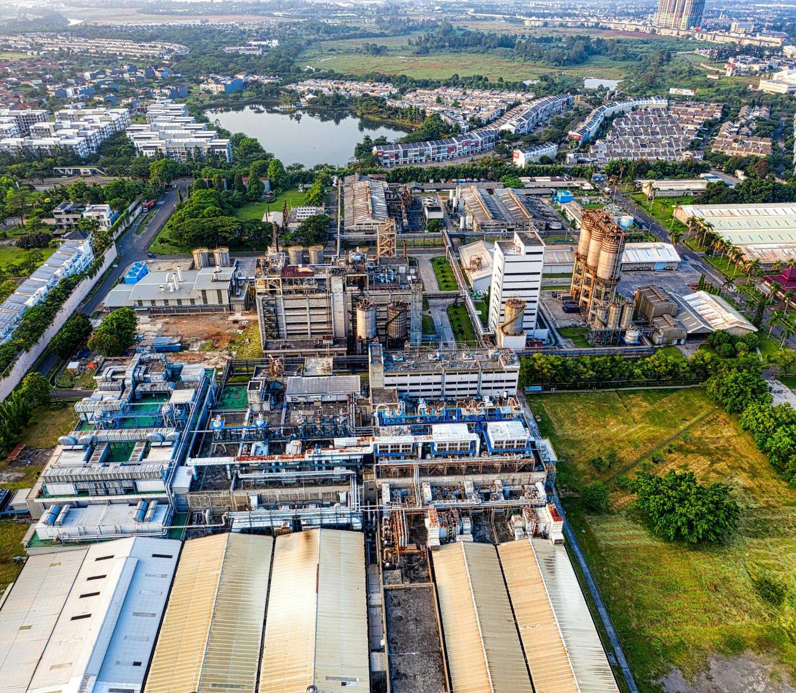 Drone aerial view of a technology hub for manufacturing and R&D within a landscape.