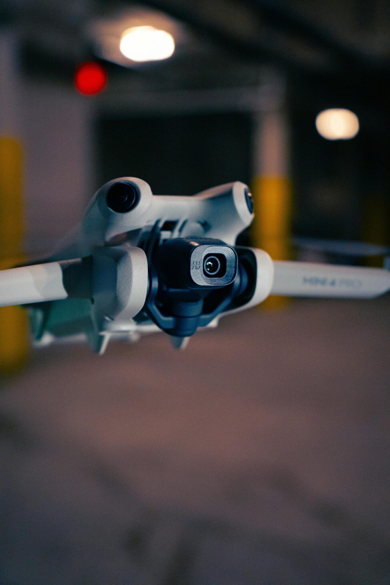 A detailed close-up of a modern drone indoors, highlighting advanced technology.