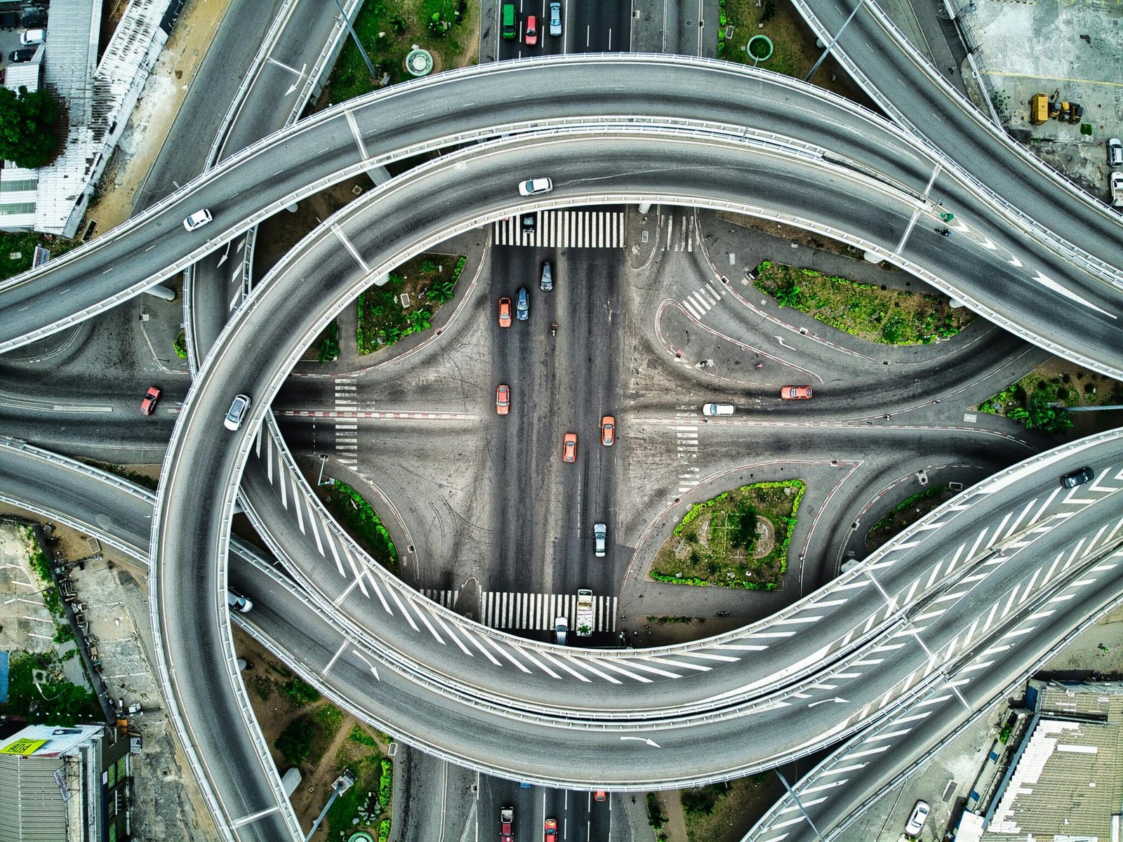 Aerial view of a modern highway interchange in Abidjan, showcasing intricate road design.
